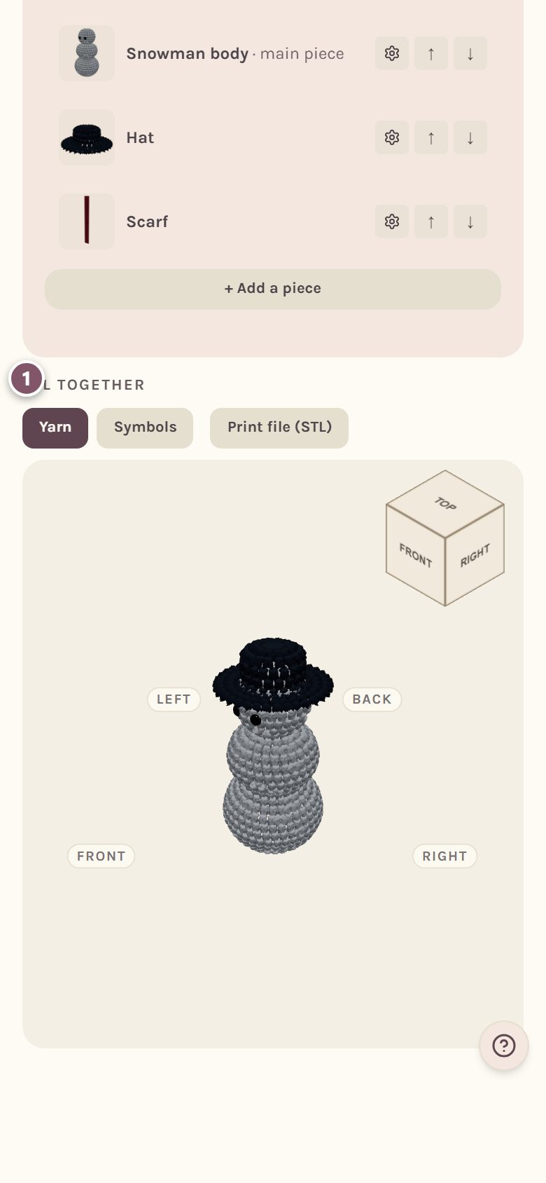 All together: the snowman in 3D with his hat and eyes, marked 1 (on a phone)