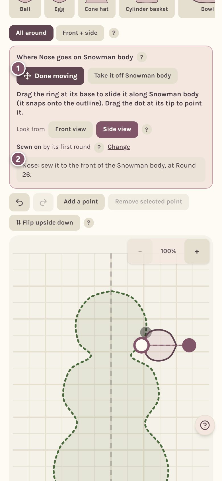 The nose placed on the snowman's face: 1 Done moving, 2 the sewing step it wrote (on a phone)